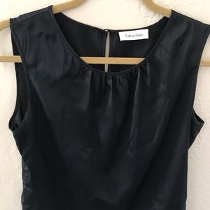 Navy blue satin blouse.